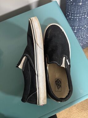 Vans men’s  Black and White Slip-On Sneakers